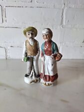Vintage Unmarked Porcelain Old Lady & Old Man Pair of Figurines picture