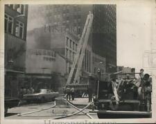 1969 Press Photo Firefighters battle a blaze at the Lerner store, Albany picture
