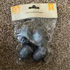 4 small grey faux leather pumpkins picture