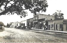 Byron IL - old hardware stores, 2 barber poles on Seconde Street; nice 1914 RPPC picture