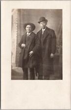 Vintage 1910s Studio RPPC Photo Postcard Two Shifty Guys in Overcoats Hats CIGAR picture