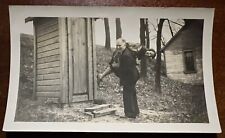 VTG c.1930s Snapshot Photo Man in Suit Carrying Woman To Outhouse Humor Weird picture