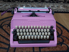 Beautifull bubbelgum pink Triumph portable vintage typewriter with case picture