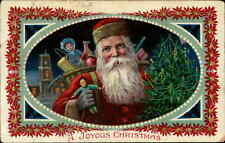 Postcard: Santa Holding Toy with bag full of Toys c.1910 picture