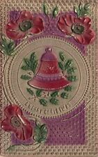 Vintage Postcard A Merry Christmas Embossed Christmas Bell & Green Leaves Wishes picture