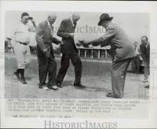 1948 Press Photo Happy Chandler waits for runners and clown at Tinker Field picture