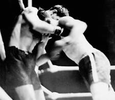 Christopher Battalino holds Billy Petrolle against the ropes as he .. Old Photo picture