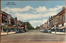 Goshen Indiana Main Street Rexall Drug Store Old Cars Vintage Postcard 1952 picture