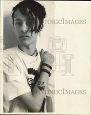 1985 Press Photo Young man with skeleton tattoo on arm, Alaska - lrb26813 picture