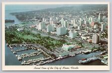 Aerial View Of The City Of Miami Florida Skyline And Marina Vintage Postcard picture
