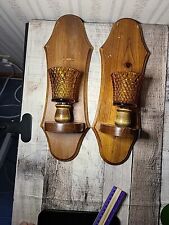 Pair of midcentury wooden wall sconces with amber votive cups. picture