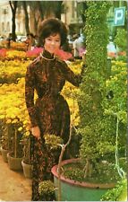postcard Vietnam : Young Vietnamese lady wearing traditional dress Ao Dai picture