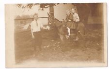 Post Card RPPC Three Children one Donkey picture