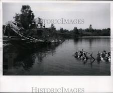 1961 Press Photo A demonstration of how to escape a submerged auto - nex98956 picture