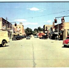1950s Ogallala NE Downtown Main Street Scene Signs Postcard Milk Rexall Cars A9 picture