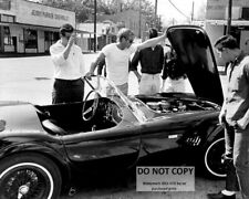 STEVE McQUEEN LOOKS UNDER HOOD OF SHELBY COBRA 289 ROADSTER - 8X10 PHOTO (AB892) picture
