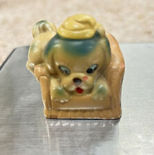 Vintage puppy ￼ wearing a night cap and climbing over a chair, Pencil Sharpner. picture