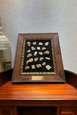 A framed group of Philistine pottery fragments picture