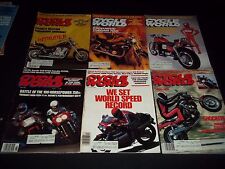 1985-1986 CYCLE WORLD MAGAZINE LOT OF 14 ISSUES - CARS AUTOMOBILES ADS - M 463 picture