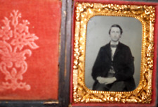 1/9th Size Ruby Ambrotype of young man in full case, split at hinge picture
