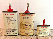 VINTAGE LOT OF 3 BUX DRI SLIDE OIL CANS DATED 1960'S picture
