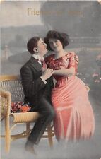 1912 Gelatin Romance Postcard of Lovers Cuddling on a Bench-Friends For Ever picture