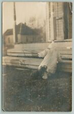 Linden IN~Little Puppy's Teeth Tugs Toddler Trying to Crawl Up Steps~1910 RPPC picture