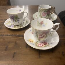 3 vintage floral cup and saucer sets picture