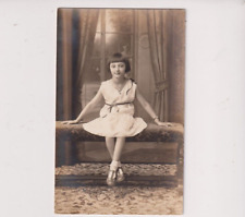 Postcard RPPC Cute Young Girl Posing On Bench Real Photo Postcard c. 1925-1934 picture