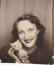 VINTAGE PHOTO BOOTH: PRETTY YOUNG WOMAN HOLDING TOY CAT picture