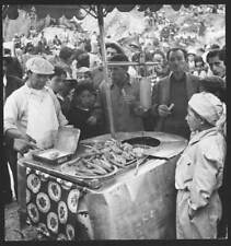 Customers crowd around a waffle vendor Inca festival Inti-Raymi Old Photo picture