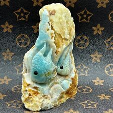 Mineral specimens of natural Marine amazonite.A hand-carved fish. picture