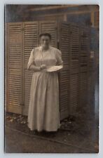 RPPC Lady Holding Pie and Utensil Outside AZO 1904-1918 ANTIQUE Postcard 1416 picture