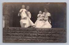 Women Holding Babies on Brick Porch RPPC Union City Indiana Antique Photo 1907 picture