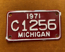 1971 Vintage Michigan Motorcycle License Plate Red and White C1256 picture