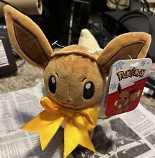 Pokemon Eevee Plush Winter Holiday Edition w Yellow Bow NWT Christmas 8 Inch picture