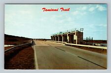 Tamiami Trail Everglades Links East West Flood Control, Florida Vintage Postcard picture