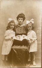 RPPC West Hoboken NJ Mother and Little Girls with Book Real Photo Postcard c1910 picture