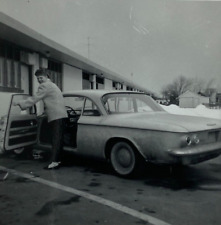 Woman Looking Over Shoulder By Chevrolet Corvair B&W Photograph 3.5 x 3.5 picture