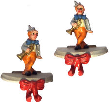 VINTAGE STOCKING HOLDER CAST IRON RARE CLOWN WITH TRUMPET LOT OF 2 picture