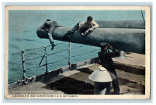 c1930s Cleaning a 12 Inch Canon on Board, US Battleship Unposted Postcard picture