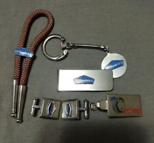 lot of 6  BF Goodrich Tire + Rubber co key ring, cuff links, tie clasp, boco picture