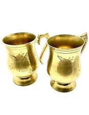 Two Vintage Etched Brass Steins picture