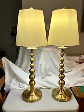 A pair Of Ralph Lauren Brushed Gold Stacked Ball Lamps. picture