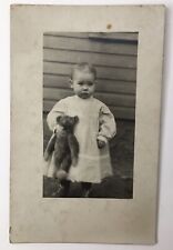 Adorable Baby Girl Holding Teddy Bear RPPC Antique PC AZO Infant in White Dress picture