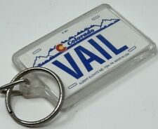 Vintage Vail Colorado Keychain License Plate Souvenir Plastic 2” Made In USA picture