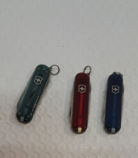 Lot of 3 Victorinox Classic 58mm Swiss Army translucent Knives - actual lot pics picture