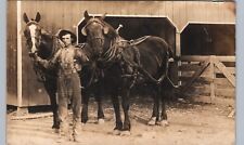 TEAMSTER & HORSE STABLE real photo postcard rppc two black barn farm team picture