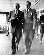 Famed conductor Arturo Toscanino and his son Walter as they arrive .. Old Photo picture