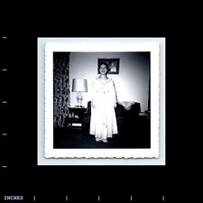 Vintage Square Photo WOMAN STANDING IN LIVING ROOM picture